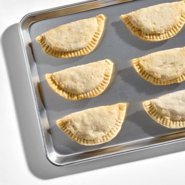 Rico Foods Chicken Sofrito Flour Shell Empanada 4 oz. - 24/Case