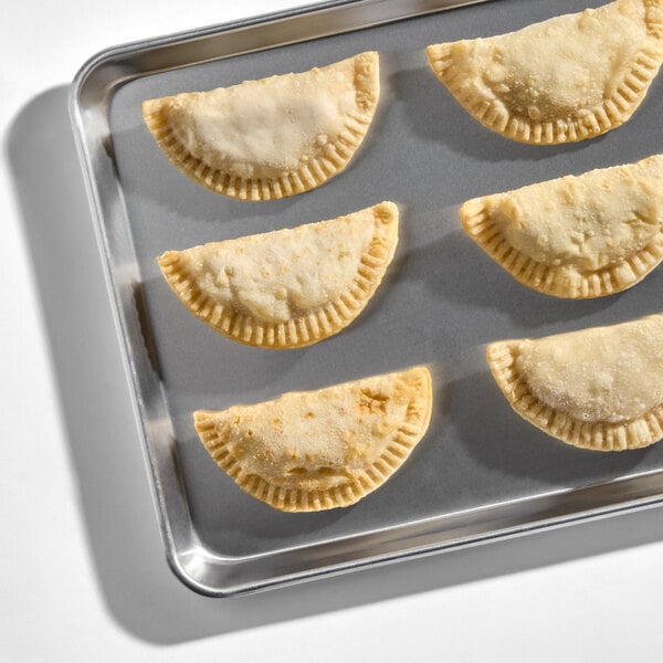 Rico Foods Cuban Pork Pernil Flour Shell Empanada 4 oz. - 24/Case