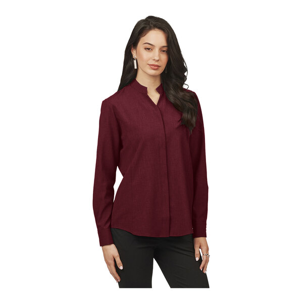 A women's long sleeve burgundy dress shirt with a stand-up collar and moisture-wicking fabric.