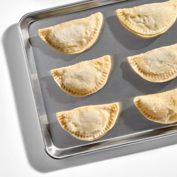 Rico Foods Philly Cheesesteak Flour Shell Empanada 4 oz. - 24/Case