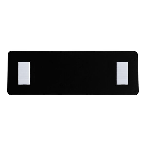 A rectangular black and white sign with the word 'Wash' intended for labeling purposes.
