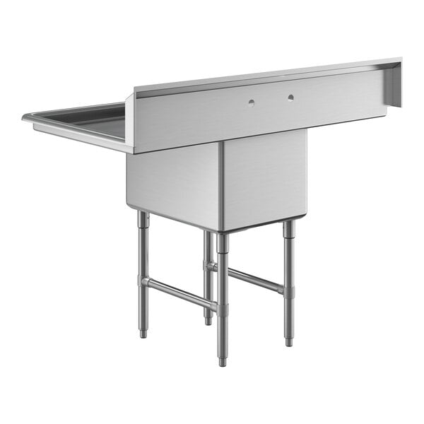 A stainless steel commercial sink with one deep basin, two side drainboards, and sturdy legs with cross bracing.
