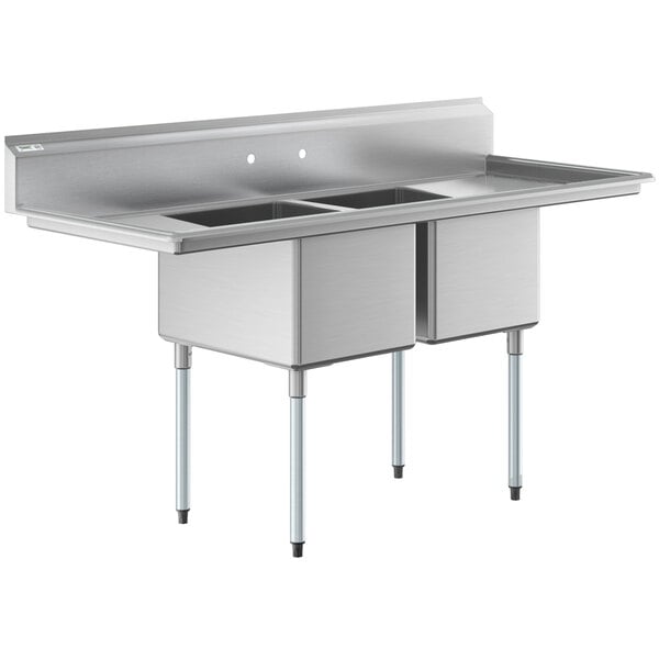 A stainless steel two-compartment commercial sink with two drainboards and galvanized steel legs.