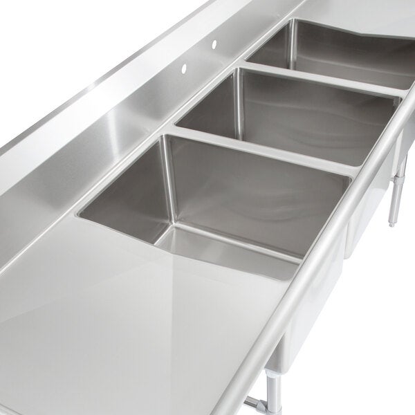 A large stainless steel three-compartment commercial sink with two drainboards, stainless steel legs, and cross bracing.