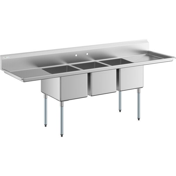 A large stainless steel three compartment commercial sink with two drainboards and galvanized steel legs.