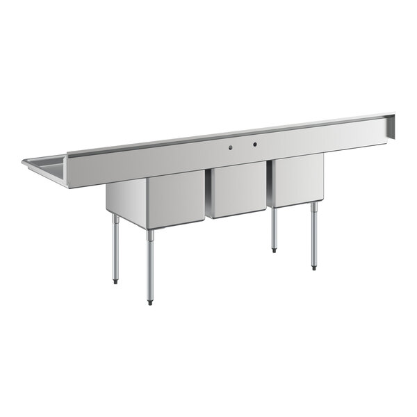 A large stainless steel three-compartment sink with four metal legs and two extended drainboards on either side.