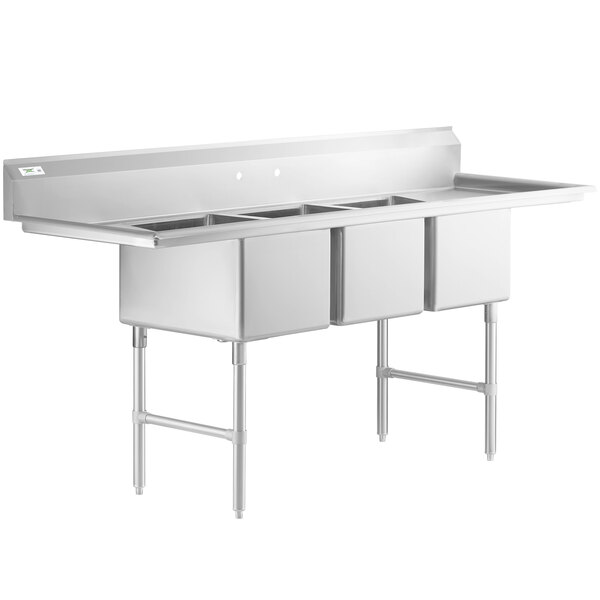A large stainless steel three-compartment commercial sink with two drainboards, stainless steel legs, and cross bracing.