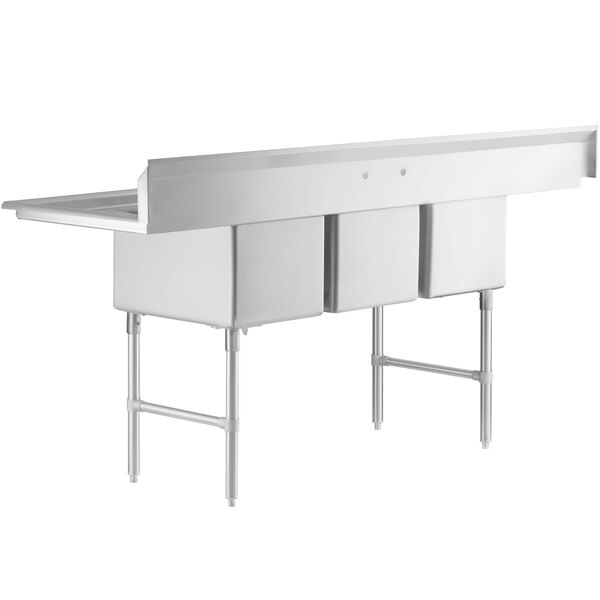 A large stainless steel three-compartment commercial sink with two drainboards, stainless steel legs, and cross bracing.