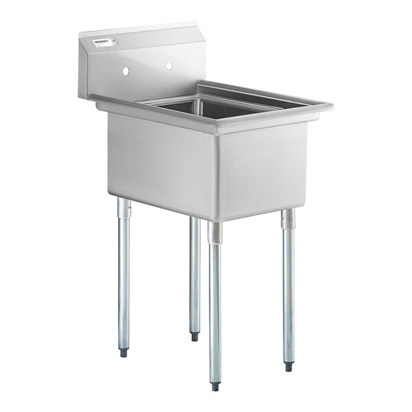 A stainless steel commercial sink with a deep rectangular basin, four metal legs, and a backsplash with two faucet holes.