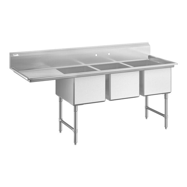 A large stainless steel commercial sink with three compartments, a left-side drainboard, and sturdy legs with cross bracing.