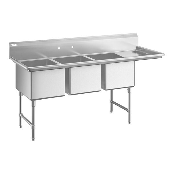 A stainless steel three-compartment commercial sink with an 18-inch right drainboard and sturdy legs with cross bracing.