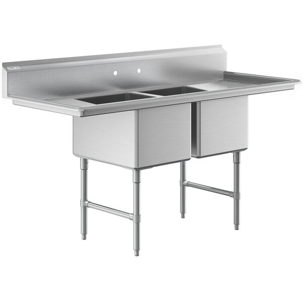 A stainless steel two-compartment commercial sink with two drainboards, stainless steel legs, and cross bracing.