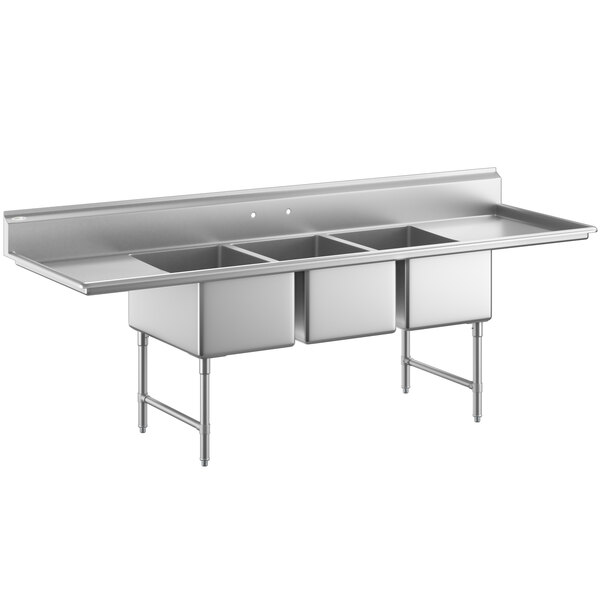 A large stainless steel three-compartment commercial sink with two drainboards, stainless steel legs, and cross bracing.