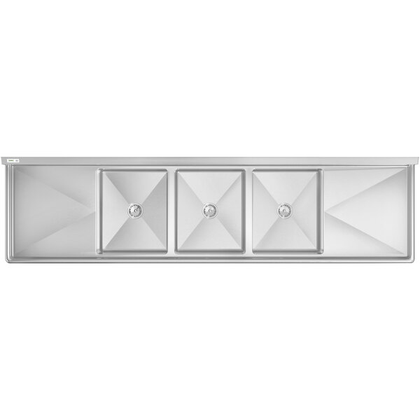 A large stainless steel commercial sink with three compartments and two drainboards.