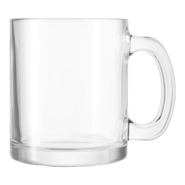 A clear glass latte macchiato mug with a handle.