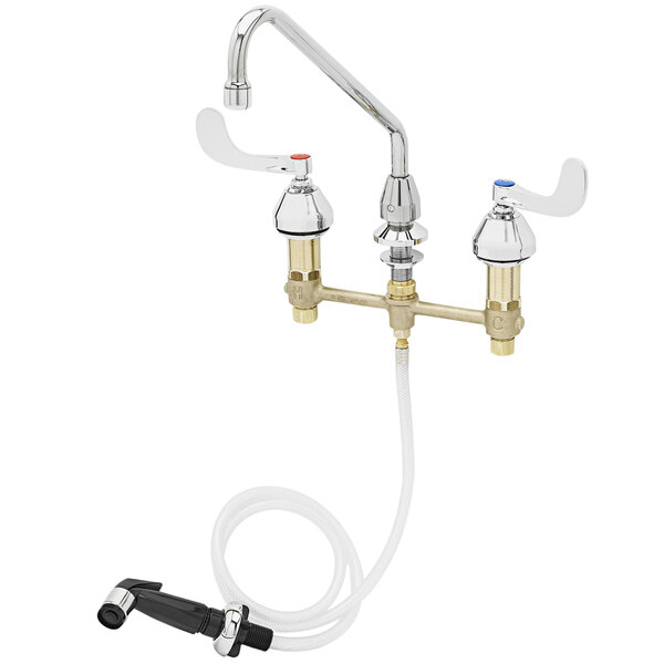 A T&S chrome deck-mount faucet with a side spray hose.