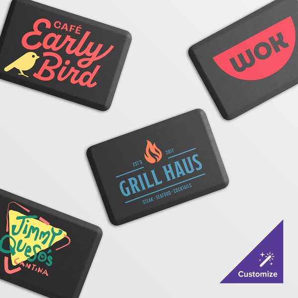 A customizable black anti-fatigue mat with beveled edges, featuring various restaurant logos.