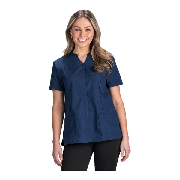 A women's vintage navy snap-front housekeeping tunic with short sleeves and two front pockets.
