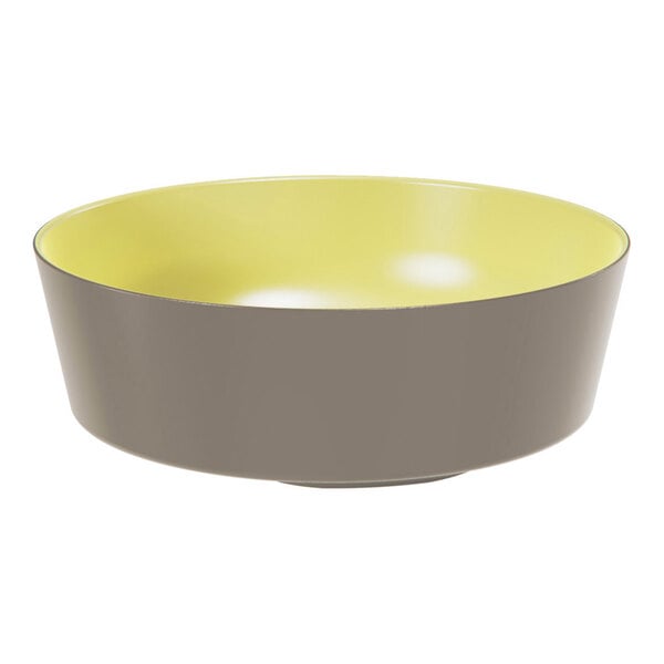 A round melamine bowl with a yellow interior and gray exterior.