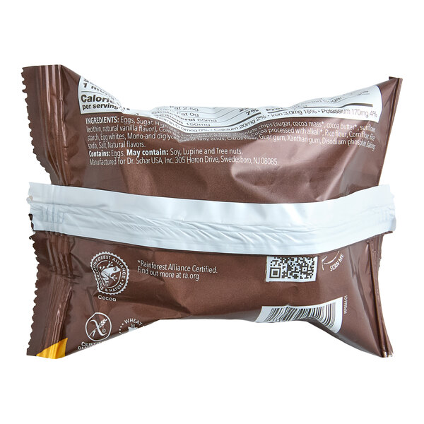 A brown and white plastic package of Schar gluten-free individually wrapped chocolate muffin.