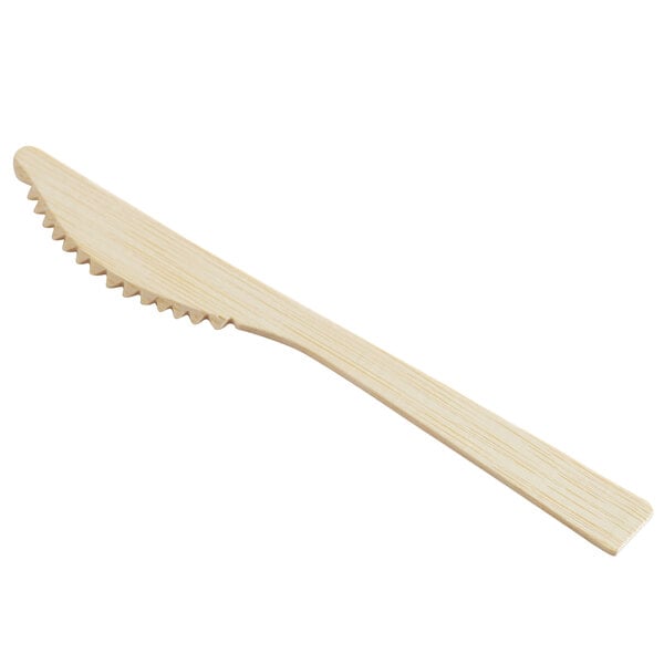 A compostable bamboo knife with a serrated edge.