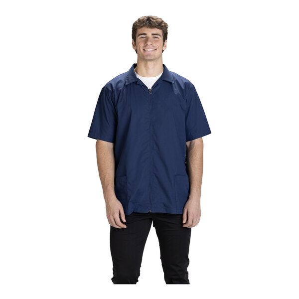 A men's short-sleeve, full-zip, vintage navy service or housekeeping shirt made from a poly/cotton blend.