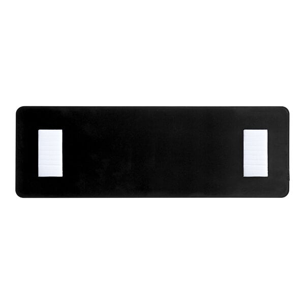 A rectangular black and white plastic sign with text indicating that employees must wash hands before returning to work.