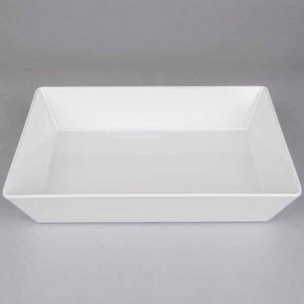 A large white rectangular melamine serving bowl.
