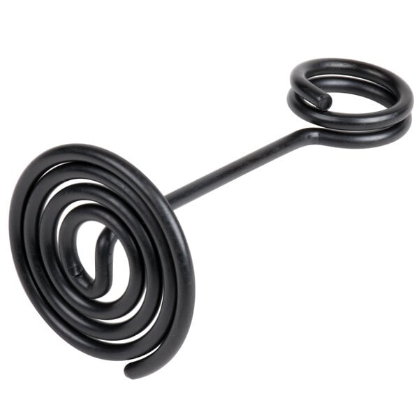 A black metal swirl base card holder with a circular design.