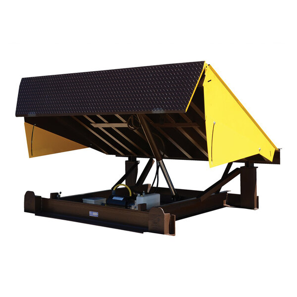 A powered hydraulic steel dock leveler with yellow side guards and a black platform.