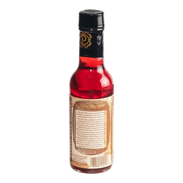 A 5 fl. oz. bottle of Peychaud's Barrel-Aged Aromatic Cocktail Bitters.