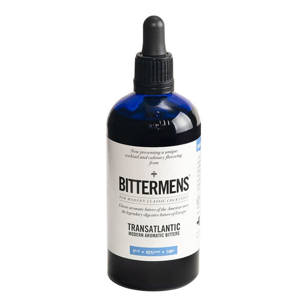 A 5 fl. oz. bottle of Bittermens Transatlantic Modern Aromatic Bitters with a dropper cap.