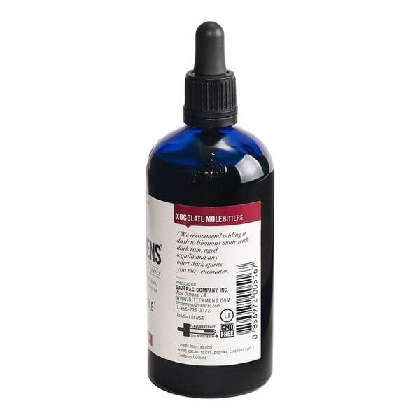 A 5 fl. oz. bottle of Bittermens Xocolatl Mole Bitters with a dropper cap.