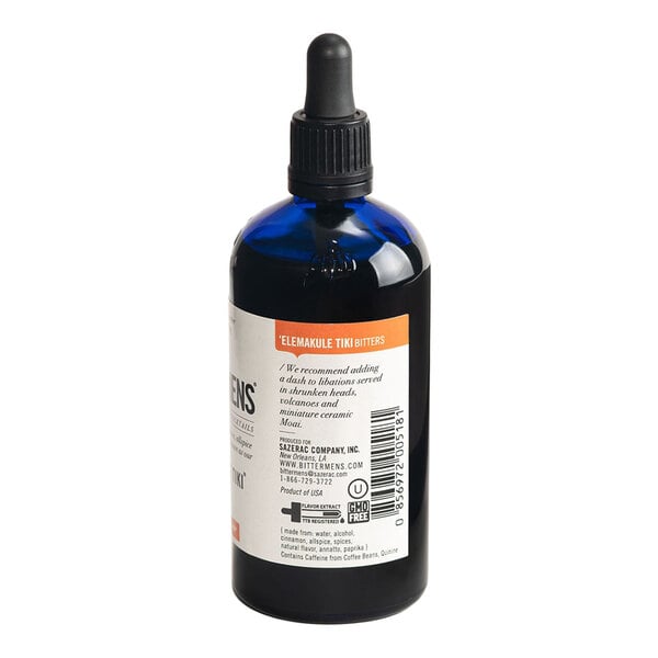 A blue glass bottle of Bittermens 'Elemakule Tiki Bitters with a dropper cap.