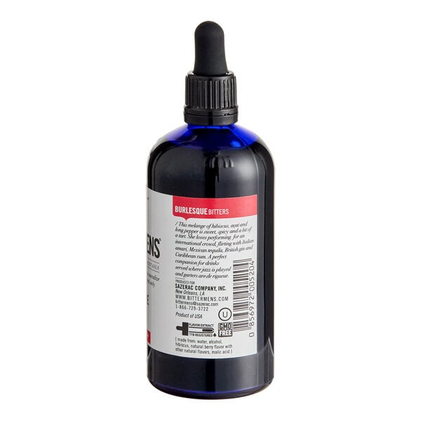 A 5 fl. oz. bottle of Bittermens Burlesque Bitters with a dropper cap.