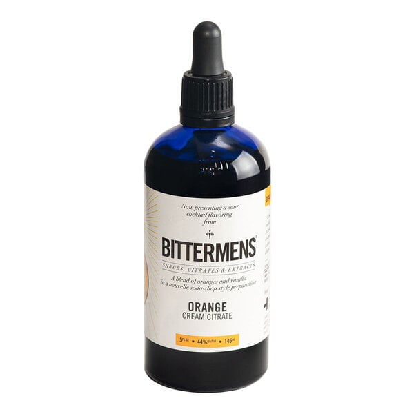 A 5 fl. oz. bottle of Bittermens Orange Cream Citrate cocktail flavoring with a dropper top.