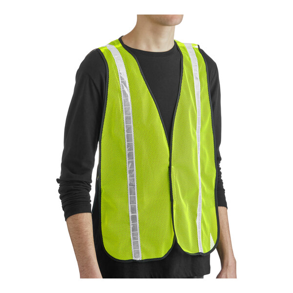 A lime high visibility safety vest with reflective tape and hook and loop closure, designed to fit most sizes.