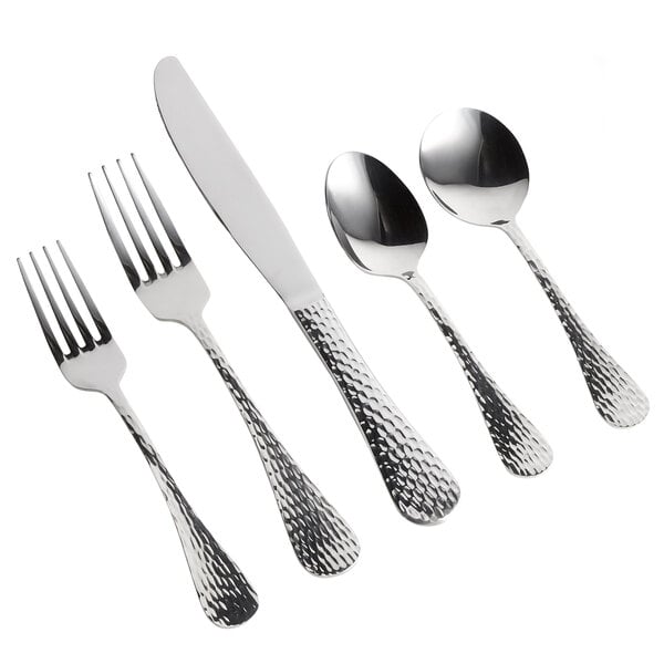 A five-piece set of stainless steel flatware with textured handles, including two forks, a knife, and two spoons.