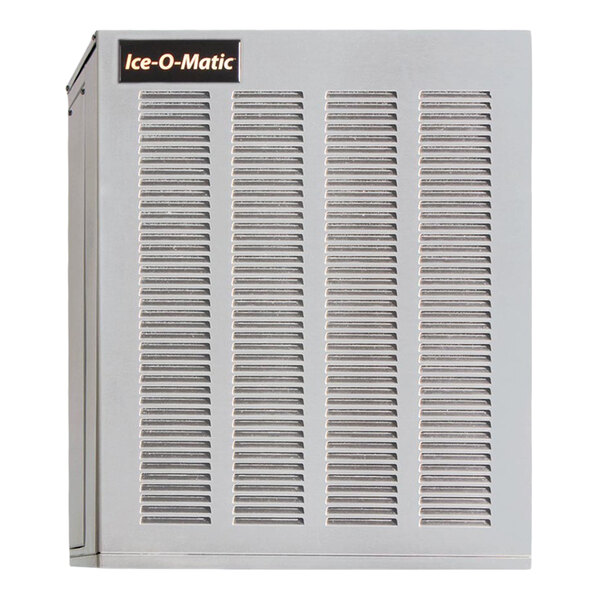 A remote-cooled flake ice machine with a vented metal exterior and Ice-O-Matic branding.