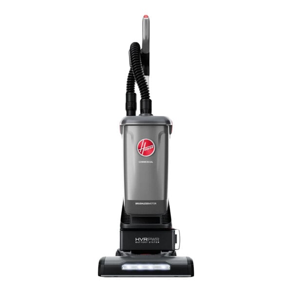 A cordless upright vacuum cleaner with a gray and black design, featuring a handle, hose, and cleaning head.