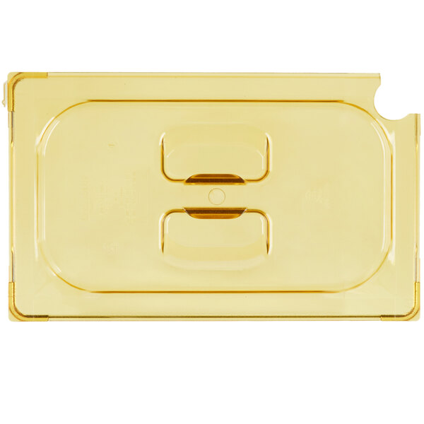 A yellow plastic Vollrath Super Pan slotted lid.