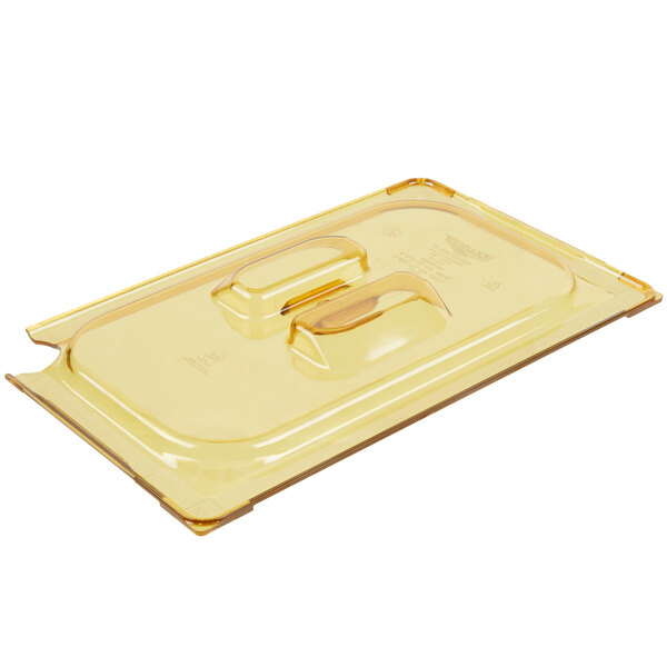 A clear plastic container with a yellow slotted lid with two handles.
