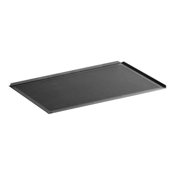 A non-stick perforated aluminum baking tray designed for half size combi ovens.
