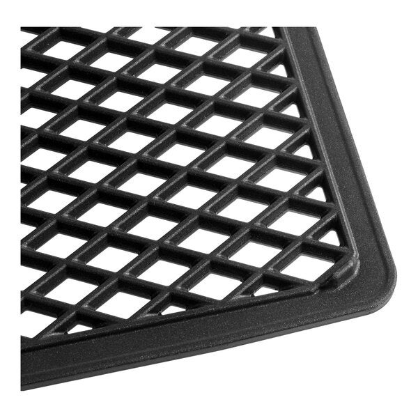 A non-stick cast aluminum double-sided diamond grill tray for half size combi ovens.