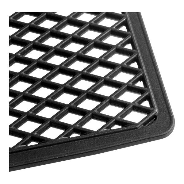 A non-stick cast aluminum double-sided diamond grill tray designed for half size combi ovens.