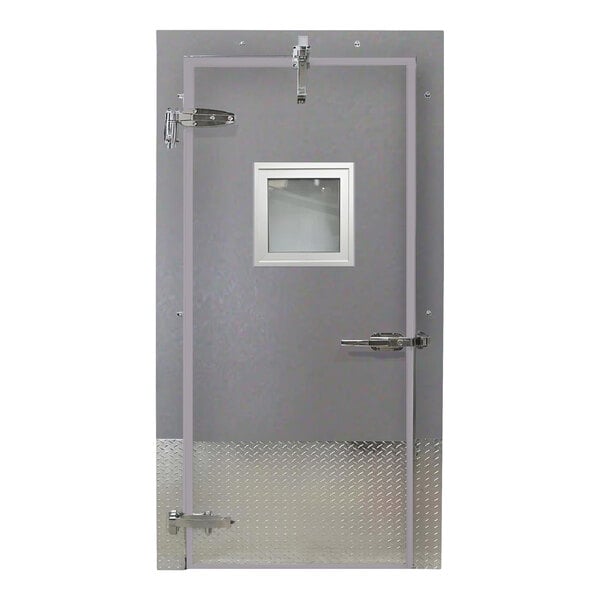A gray embossed steel cold storage freezer door with a window, heated frame, and right-side handle.