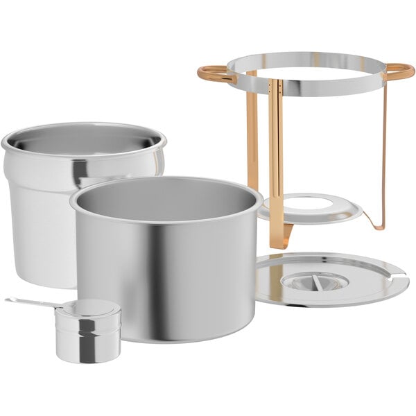 A stainless steel marmite soup chafer set with gold accents, including a stand, lid, insert, water pan, and ladle.