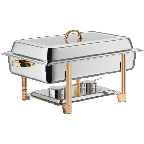 A stainless steel full-size chafer with gold accents and a rectangular lid, used for serving hot food at events.