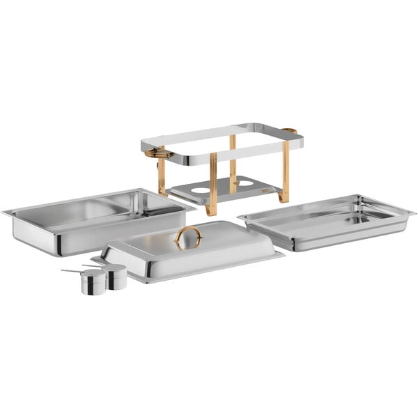 A stainless steel full size chafer set with gold accents, including a frame, food pans, lid, and fuel holders.