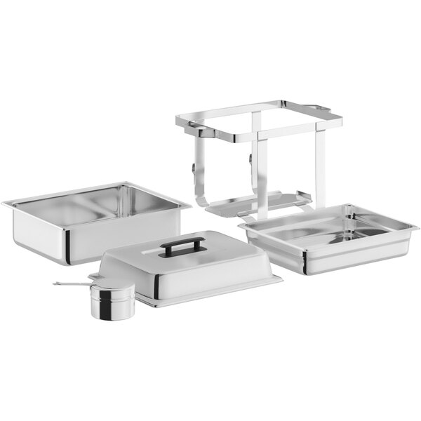 A stainless steel half size chafer set with a lid, frame, food pan, water pan, and serving utensil.